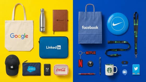 Corporate gifts flat lay with branded tumblers and stationery
