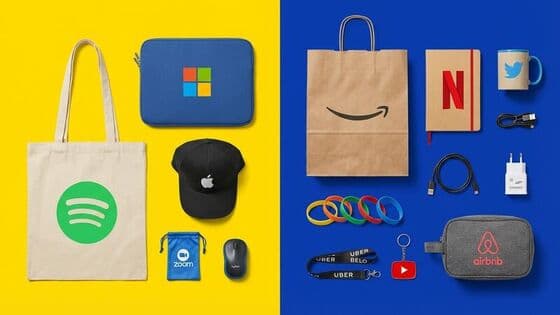 Corporate gift flat lay with laptop sleeves caps and accessories